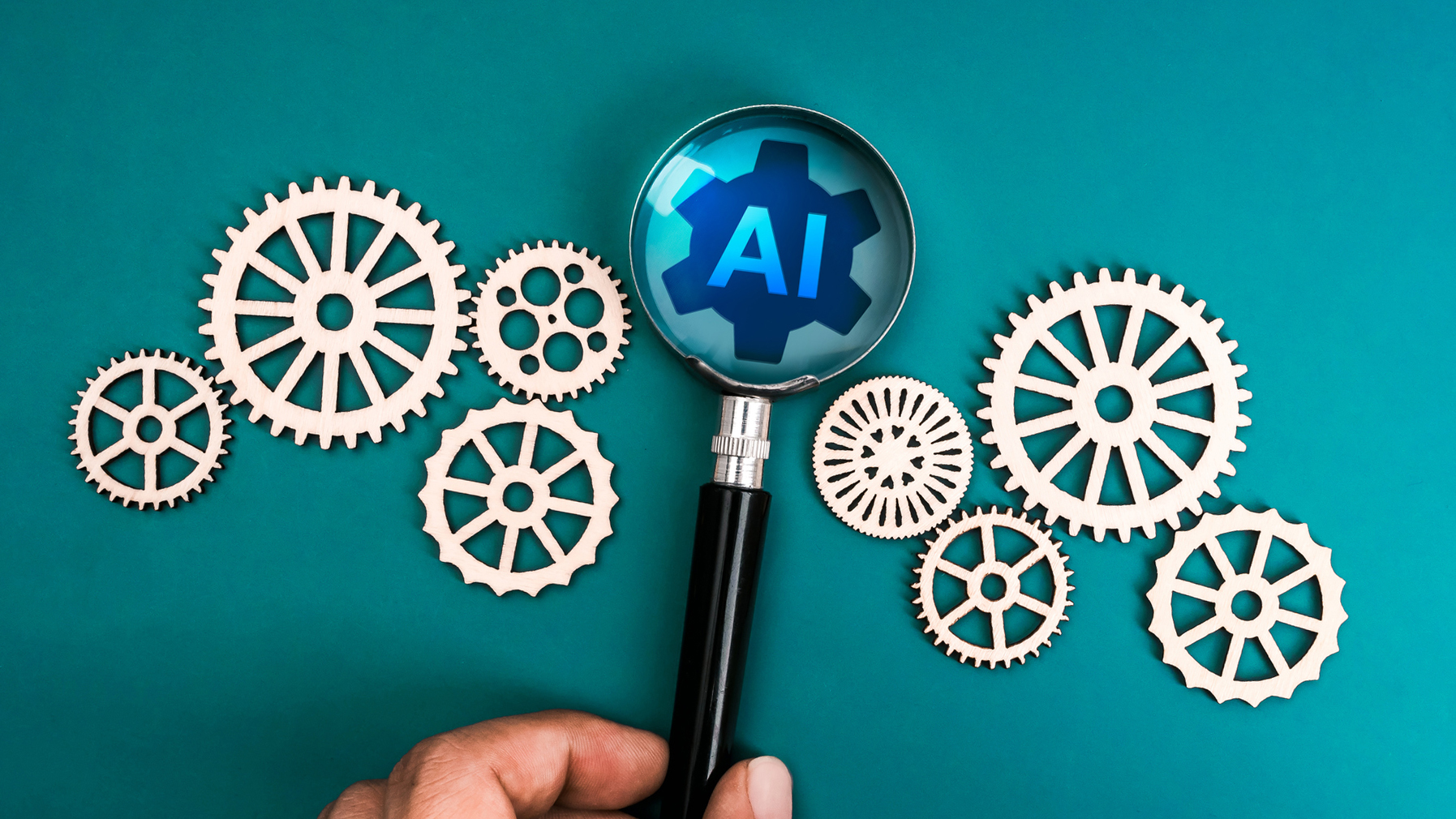 graphic of magnifying glass with the letters AI behind it